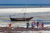 Local people on the beach at Nungwi village, Nungwi, Zanzibar, Tanzania, Africa