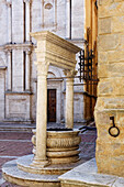 Well in Church Square, Pienza, Tuscany, Italy