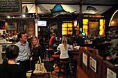 People at restaurant Enterprise Fish Company, Santa Barbara at Highway 1, Pacific rim, California, USA, America