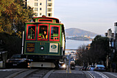 View of a cable car and the island of Alcatraz, San Francisco, California, USA, America