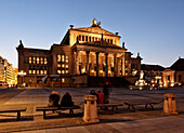 People in front of the Schauspielhaus at night, Gendarmenmarkt, Mitte, Berlin, Germany, Europe