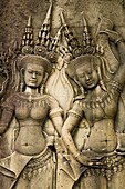 Cambodia, Angkor, Angkor Wat Close up details of Angkor relief art on the walls of the dramatic remains of Angkor Wat
