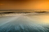 sunset at the beach in malaga, spain