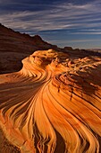 Sandstone formation in Coyote Buttes notrh area illuminated by reflected morning light deep in one southwestern canyon