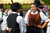 Hungarian folk dancers in tradtional Hungarian costume celebrating the wine festival - Badascony, Hungary