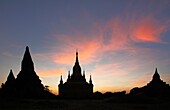 Myanmar, Burma, Bagan, temples silhouette at sunset