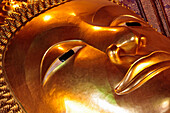Detail of the Head of a Reclining Buddha, Wat Pho (Wat Phra Chetupon) Or Temple of the Reclining Buddha, the Oldest and Biggest in Bangkok, Thailand, Asia