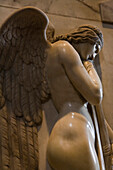 Sorrowful angel flanking the Monument to the Stuarts, St. Peter's Basilica, Rome, Italy