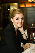 Woman in restaurant, portrait