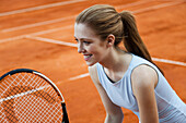 Teen girl playing tennis