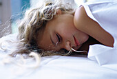 Girl sleeping in bed