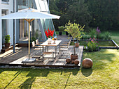 Modern private house with terrace, pond and garden furniture, near Bad Aibling, Bavaria, Germany