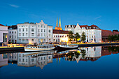 View over the Trave river to the old town of Luebeck with Luebeck cathedral, Hanseatic city of Luebeck, Baltic Sea, Schleswig-Holstein, Germany