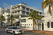 US, Florida, Miami Beach, Ocean drive, Art Deco facades, police car
