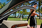 US, Florida, Miami Beach, Ocean drive, man view from a car