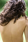 Naked young woman, rear view