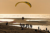 France, Aquitaine, Gironde, Bassin d'Arcachon, dune du Pilat at sunset, paragliding