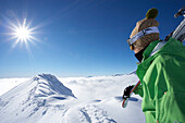 France, Alps, Hautes Alpes, Champsaur valley, skier looking at mountain