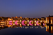 France, Midi-Pyrénées, Haute-Garonne, Toulouse by night, illuminated bridge over the river Garoone