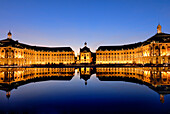 France, Aquitaine, Gironde, Bordeaux, Exchange square by night, reflecting in basin