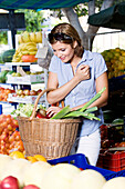 Young woman shopping at market