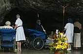 France, Pyrénées, Lourdes, Disabled persons at Lourdes grotto