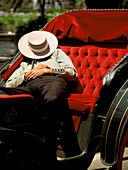 Spain, Andalousia, fériak man sleeping in a cart