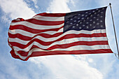 US Flag Blowing in Wind