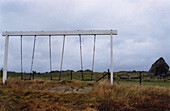 Swings Against Rural Landscape