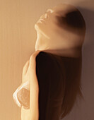Sensuous Woman in Bra Standing Behind Sheer Fabric, Portrait