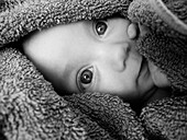 Smal Child Wrapped in Towel