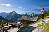 People at the terrace of mountain hut, Plumsjoch hut, Karwendel mountains, Tyrol, Austria, Europe