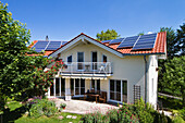 Photovoltaics on detached family house with garden, Upper Bavaria, Bavaria, Germany, Europe
