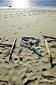 Letter made out of jetsam on the beach, Koh Lanta, Andaman Sea, Thailand