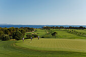 View of golf course at the coast, Club de Golf Alcanada, Isla d'Alcanada, Mallorca, Balearic Islands, Spain, Europe