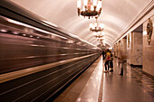 Train arrives at Metro underground rail station, St. Petersburg, Russia