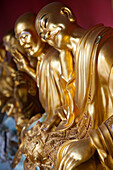 Golden Buddha statues at Wat Tham Khao Noi, Khao Noi Cave Temple, near Kanchanaburi, Thailand