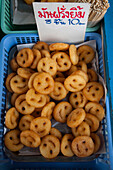 Happy Donuts: Frittierte Gebäckstücke mit Smiley-Gesicht, Bangkok, Thailand, Asien