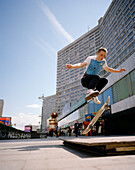 Skater in front of high rise buildings at New Arbat, Uliza Nowyj Arbat, Moscow, Russia, Europe