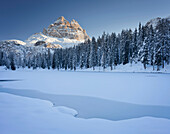 The frozen lake Lago Antorno in front of the Three Peaks, Sexten Dolomites, Veneto, Italy, Europe