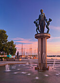 Fountain with statue at harbour in the evening, Oslo, Norway, Europe