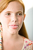 Close-up of a girl sticking her tongue out