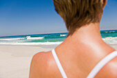 Rear view of a woman on the beach