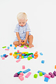 Baby boy playing with blocks