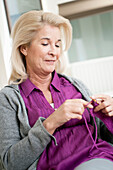 Close-up of a woman knitting