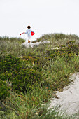 Boy running on the beach