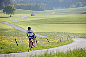 Radfahrer bei Münsing, Bayern, Deutschland