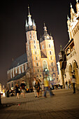 Market square with St. Marys basilica, old town of Krakow at night, Krakow, Poland
