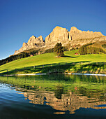 Rosengarten mountain range with Rotwand, Reflections in a mountain lake, Rosengarten, Dolomites, UNESCO World Heritage Site, South Tyrol, Italy