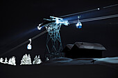 Illuminated cable car above ski slope at night, Alpe di Siusi, Valle Isarco, Alto Adige, South Tyrol, Italy, Europe